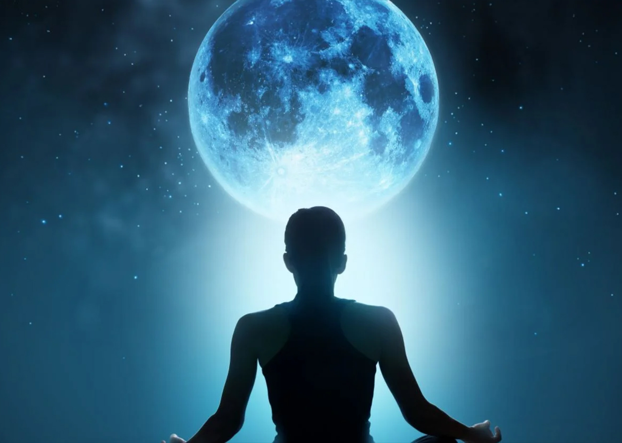 meditating silhouette blue moon